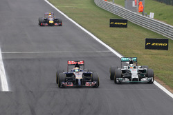 Jean-Eric Vergne, Scuderia Toro Rosso and Lewis Hamilton, Mercedes AMG F1 Team