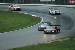 Mike Skeen, Audi R8 and Ryan Dalziel, Porsche 911 GT3 battle for the lead.