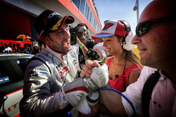 Race winner Jose Maria Lopez celebrates