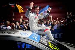 Race winner Jose Maria Lopez celebrates