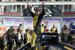 Marcos Ambrose celebrates