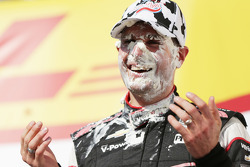 Race winner Will Power gets a face full of cream puff