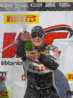 GTS Winner Jack Baldwin celebrates with champagne