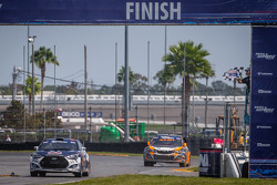 #67 Hyundai / Rhys Millen Racing Hyundai Veloster: Rhys Millen takes the checkered flag