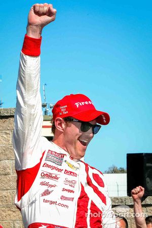 Race winner Scott Dixon celebrates