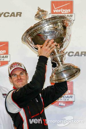 Championship winner Will Power celebrates