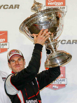 Championship winner Will Power celebrates