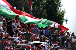 Fans with a large Italian flag