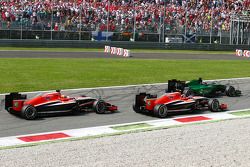 Kamui Kobayashi, Caterham CT05 leads Max Chilton, Marussia F1 Team MR03 and Jules Bianchi, Marussia F1 Team MR03 on the grid