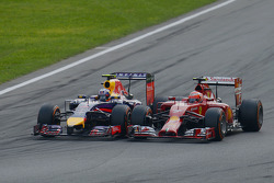 Daniel Ricciardo, Red Bull Racing RB10 and Kimi Raikkonen, Ferrari F14-T battle for position
