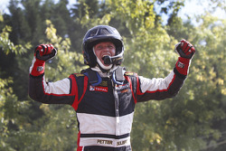 Winner Petter Solberg celebrates