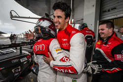 Pole winner Christopher Mies celebrates with Cesar Ramos