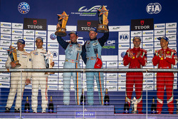 LMGTE Pro class podium: first place Darren Turner, Stefan Mücke, second place Frédéric Makowiecki, Patrick Pilet, third place Gianmaria Bruni, Toni Vilander