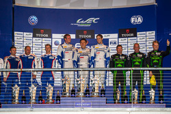 LMP 2 class podium: first place Matthew Howson, Richard Bradley, Tsugio Matsuda, second place Serguey Zlobin, Nicolas Minassian, Maurizio Mediani, third place Scott Sharp, Ryan Dalziel, Ed Brown