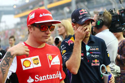 Kimi Raikkonen, Ferrari and Sebastian Vettel, Red Bull Racing on the drivers parade