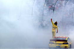 Joey Logano celebrates