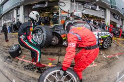 Pit stop for #90 Scuderia Villorba Corse Ferrari 458 Italia: Andrea Rizzoli, Stefano Gai, Thomas Kemenater