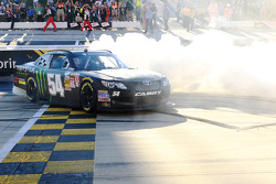 Race winner Kyle Busch celebrates