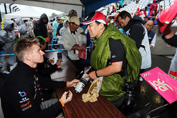 Nico Hulkenberg, Sahara Force India F1 signs autographs for the fans
