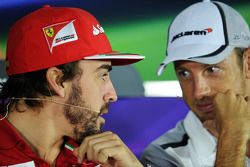 (L to R): Fernando Alonso, Ferrari and Jenson Button, McLaren in the FIA Press Conference