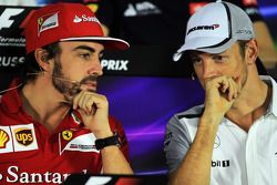 (L to R): Fernando Alonso, Ferrari and Jenson Button, McLaren in the FIA Press Conference