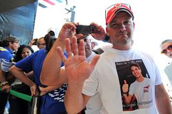 A fan wearing a Jules Bianchi, Marussia F1 Team T-Shirt at the Fanzone