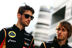 (L to R): Romain Grosjean, Lotus F1 Team with Charles Pic, Lotus F1 Team Third Driver