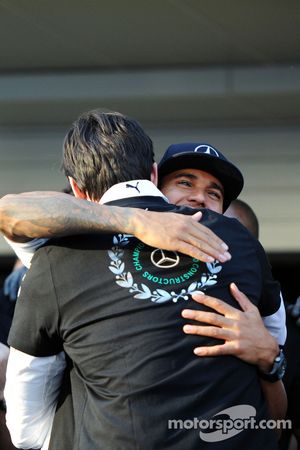 Lewis Hamilton, Mercedes AMG F1 celebrates winning the 2014 Constructors Championship with Toto Wolff, Mercedes AMG F1 Shareholder and Executive Director and the team