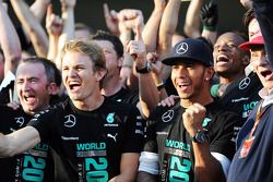 (L to R): Paddy Lowe, Mercedes AMG F1 Executive Director, Mercedes AMG F1; Lewis Hamilton, Mercedes AMG F1; Toto Wolff, Mercedes AMG F1 Shareholder and Executive Director; and Niki Lauda, Mercedes Non-Executive Chairman celebrate winning the 2014 Construc