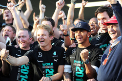 (L to R): Paddy Lowe, Mercedes AMG F1 Executive Director, Mercedes AMG F1; Lewis Hamilton, Mercedes AMG F1; Toto Wolff, Mercedes AMG F1 Shareholder and Executive Director; and Niki Lauda, Mercedes Non-Executive Chairman celebrate winning the 2014 Construc