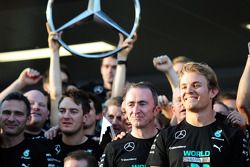 (L to R): Paddy Lowe, Mercedes AMG F1 Executive Director, and Nico Rosberg, Mercedes AMG F1 celebrate winning the 2014 Constructors Championship with the team