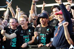 (L to R): Paddy Lowe, Mercedes AMG F1 Executive Director, Mercedes AMG F1; Lewis Hamilton, Mercedes AMG F1; Toto Wolff, Mercedes AMG F1 Shareholder and Executive Director; and Niki Lauda, Mercedes Non-Executive Chairman celebrate winning the 2014 Construc