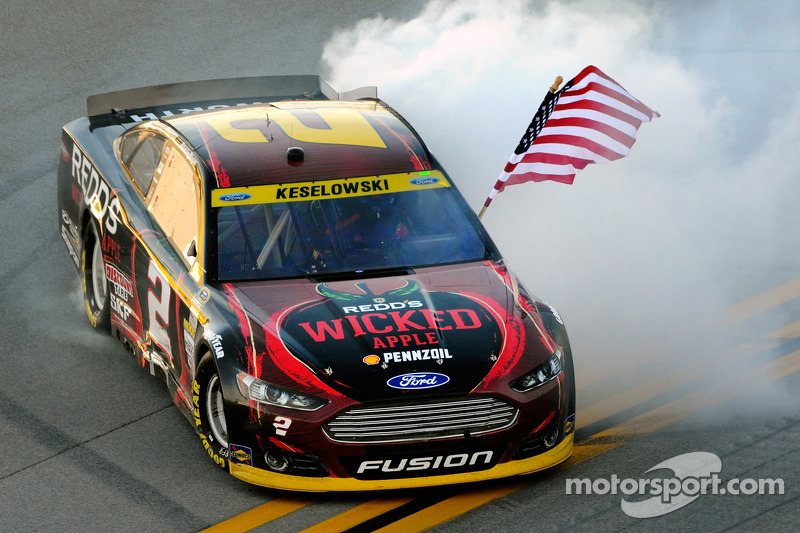 Race winner Brad Keselowski celebrates