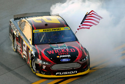 Race winner Brad Keselowski celebrates