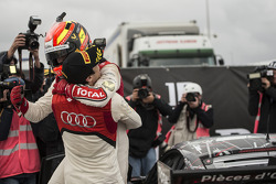 Stéphane Ortelli celebrates with race winner Laurens Vanthoor