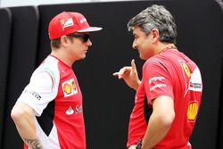 (L to R): Kimi Raikkonen, Ferrari with Marco Mattiacci, Ferrari Team Principal