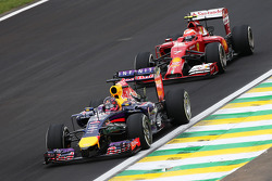 Sebastian Vettel, Red Bull Racing RB10 leads Kimi Raikkonen, Ferrari F14-T