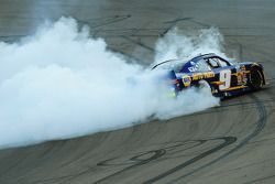 2014 champion Chase Elliott celebrates