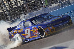 2014 champion Chase Elliott celebrates