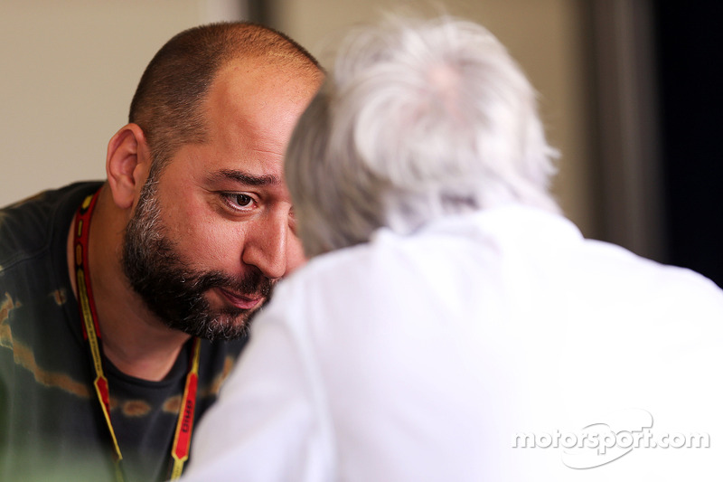 Gerard Lopez, Principal Lotus F1 Team con Bernie Ecclestone (GBR)