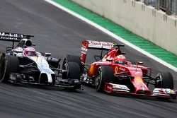 Jenson Button, McLaren F1 Team and Kimi Raikkonen, Scuderia Ferrari