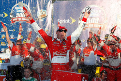 Race winner Kevin Harvick celebrates
