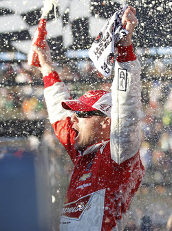 Race winner Kevin Harvick celebrates