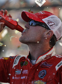 Race winner Kevin Harvick celebrates