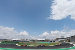 Fernando Alonso, Ferrari F14-T leads Sebastian Vettel, Red Bull Racing RB10