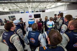 Darren Turner and Stefan Mücke watch the final moments of qualifying