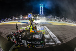 NASCAR Camping World Truck Series 2014 champion Matt Crafton celebrates with race winner Darrell Wallace Jr. and Kyle Busch