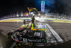 NASCAR Camping World Truck Series 2014 champion Matt Crafton celebrates with race winner Darrell Wallace Jr. and Kyle Busch