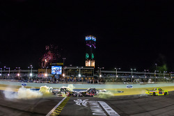 NASCAR Camping World Truck Series 2014 champion Matt Crafton celebrates with race winner Darrell Wallace Jr. and Kyle Busch