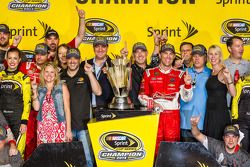 Race winner and 2014 NASCAR Sprint Cup series champion Kevin Harvick, Stewart-Haas Racing Chevrolet celebrates with Tony Stewart, DeLana Harvick and Gene Haas